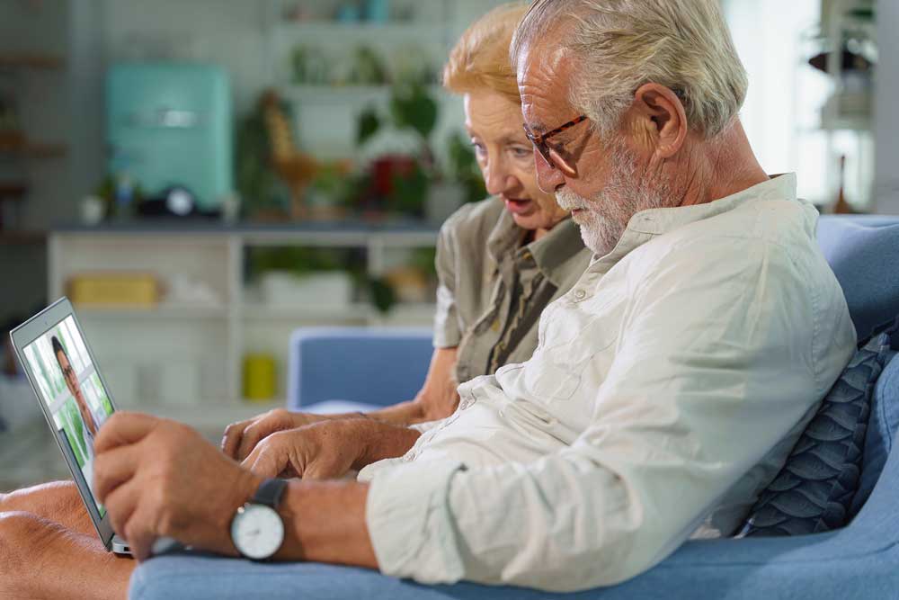 Elderly caucasian couple using Telehealth